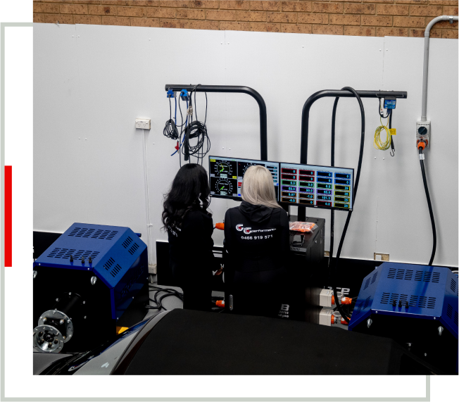 A woman is working in an industrial setting.